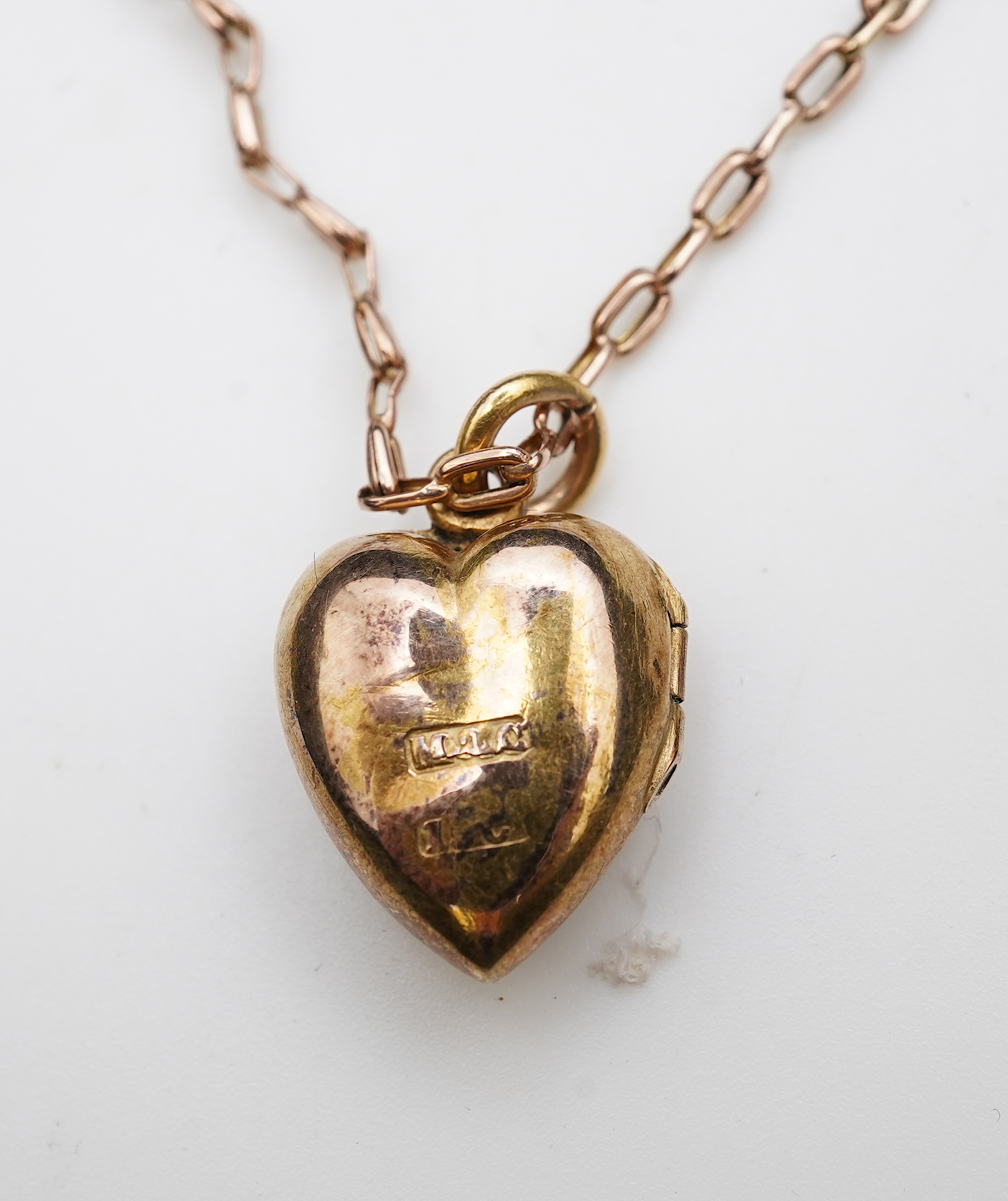 A ruby, sapphire and diamond locket pendant, early 20th century